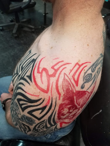 Explore loyalty tattoo ideas for men, creative tattoo ideas in Council Bluffs, available at Lil Bros Tattoo