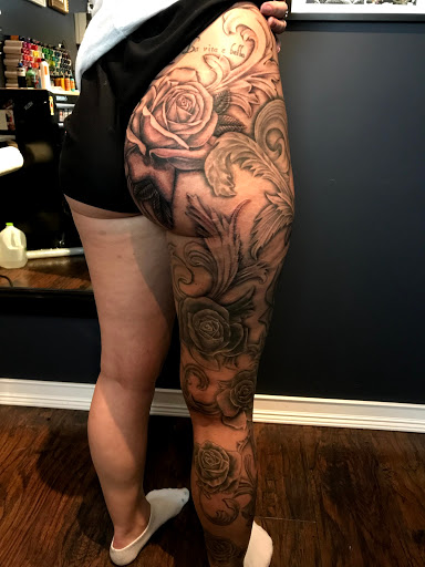 Explore black men tattoo ideas, creative tattoo ideas in Kingsford, available at Deft Tattoo Studio