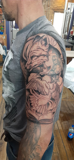 Tattoo Shop «Eclectic Art Tattoo Gallery», reviews and photos, 615 E Michigan Ave, Lansing, MI 48912, USA