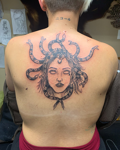 Explore romans 8 18 tattoo ideas, creative tattoo ideas in Marion, available at Marion Ink Tattoo Studio