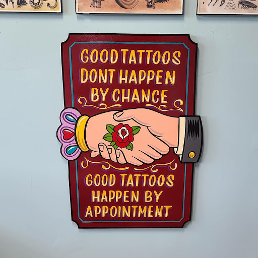 Explore cross tattoo ideas for women, creative tattoo ideas in Calhoun, available at A Sailors Grave Tattoo Parlor