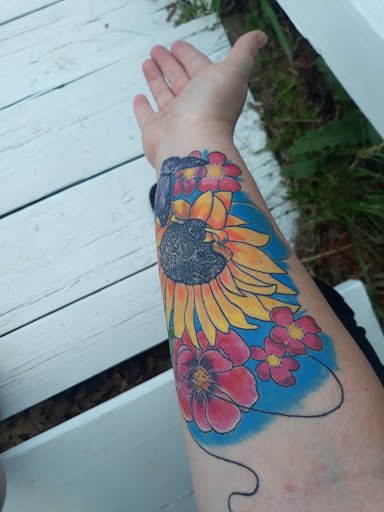 Find red indian tattoo ideas for your next unique tattoo in Cumberland at Queen City Ink