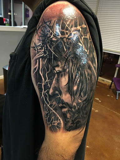 Explore guns and roses tattoo ideas, creative tattoo ideas in Arlington, available at Urbans Tattoo & Piercing Studio