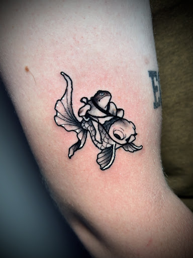Explore charizard tattoo ideas, creative tattoo ideas in Adrian, available at Ambition Ink