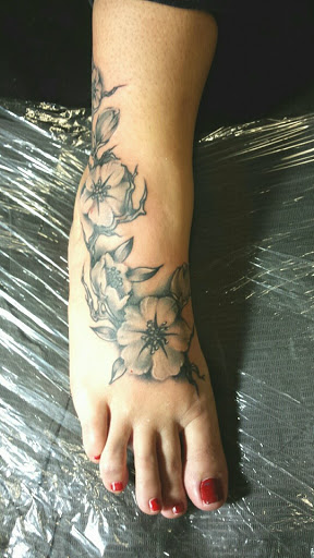 Tattoo Shop «Red Room Social Club Emporium», reviews and photos, 115 W Nepessing St, Lapeer, MI 48446, USA