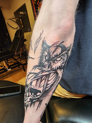 Explore religious cross tattoo ideas, creative tattoo ideas in Minocqua, available at Walking Arts Tattoos