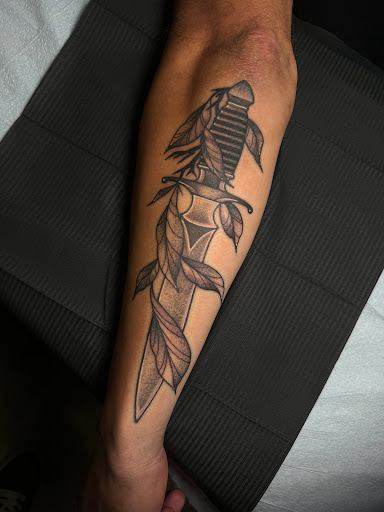 Explore wedding ring tattoo ideas for men, creative tattoo ideas in Norco, available at Live Canvas Tattoo Parlour