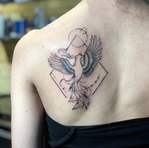 Explore purple heart tattoo ideas, creative tattoo ideas in New York, available at Red Baron Ink Tattoo and Piercing