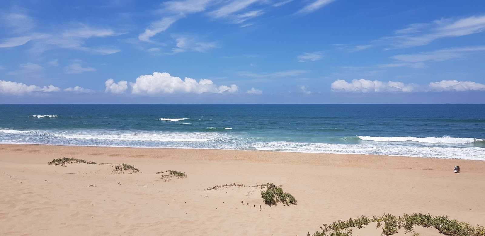 Photo of Amanzimtoti beach and the settlement