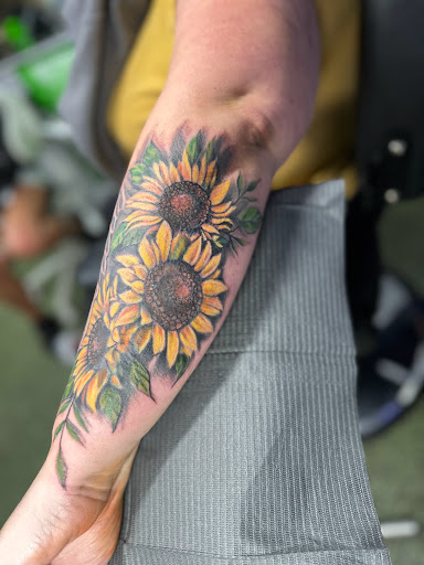 Explore lily tattoo ideas, creative tattoo ideas in Ronkonkoma, available at Ink Buster Tattoo