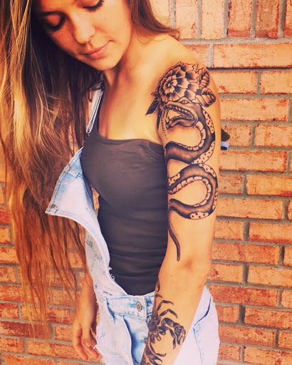 Explore cherub tattoo ideas, creative tattoo ideas in Saint Marys, available at Empire Tattoo