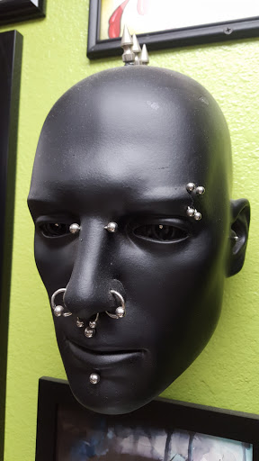 Explore wedding band tattoo ideas for him, creative tattoo ideas in Redondo Beach, available at Pacific Sangha Tattoo and Body Piercing