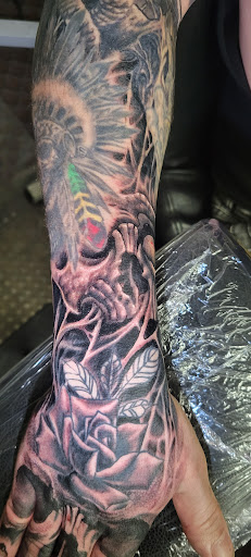 Explore dachshund tattoo ideas, creative tattoo ideas in Angola, available at Hoodlum Ink