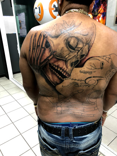 Explore flower leg tattoo ideas, creative tattoo ideas in Bridgeport, available at Evolution Tattoo