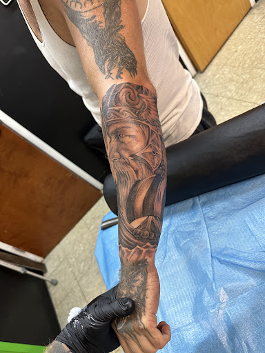 Explore invincible tattoo ideas, creative tattoo ideas in Columbus, available at Timeless Ink Tattoos