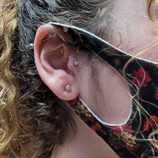 Explore thigh tattoo ideas woman, creative tattoo ideas in Marysville, available at Hawaiian Touch Piercing Co.