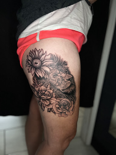 Explore wrestling tattoo ideas, creative tattoo ideas in Cadillac, available at Limitless Ink Tattoo Studio