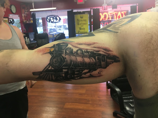 Find elephant tattoo ideas for ladies for your next unique tattoo in Largo at Alchemy Tattoos and Body Piercings
