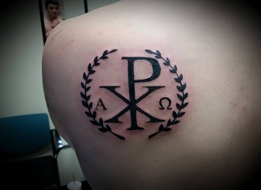 Explore black mens tattoo ideas, creative tattoo ideas in Frisco, available at Frisco Tattoo Company - Steel PaintBrush