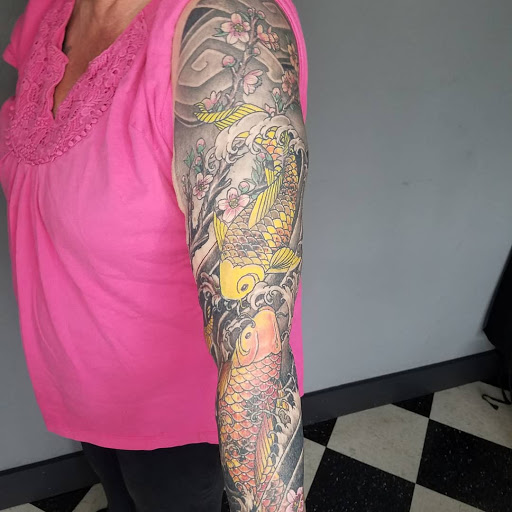 Explore sloth tattoo ideas, creative tattoo ideas in Eureka, available at Bohemian Tattoo