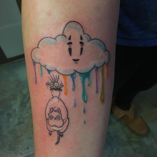 Explore circle tattoo cover up ideas, creative tattoo ideas in Redding, available at The Salty Sloth Tattoo