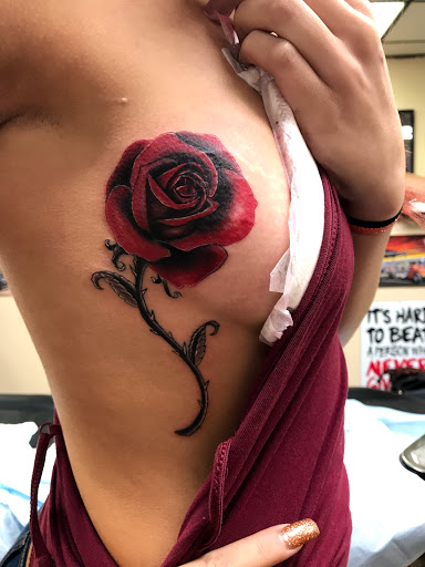 Explore blackout tattoo cover up ideas, creative tattoo ideas in Hialeah, available at The Shop Tattoo Studio