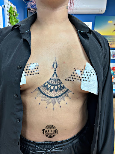 Explore haiti tattoo ideas, creative tattoo ideas in West Babylon, available at Bizzy Empire Tattoo