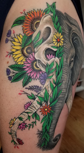 Explore flower half sleeve tattoo ideas, creative tattoo ideas in Georgetown, available at Body Art Tattoos