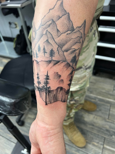 Explore womb tattoo ideas, creative tattoo ideas in El Paso, available at American Tattoo Society of Ft Bliss