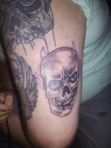 Explore joker and harley quinn tattoo ideas, creative tattoo ideas in Hanceville, available at Dodge City Tattoo Company