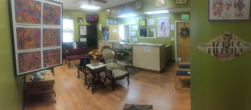 Explore lion and lamb tattoo ideas, creative tattoo ideas in Catonsville, available at Best of Time Tattoos and Body Piercing