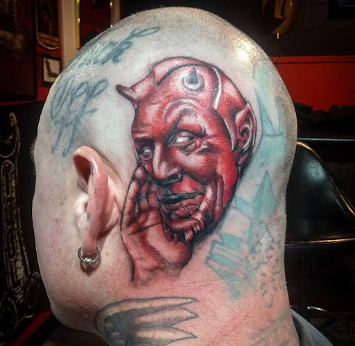 Explore thigh tattoos ideas, creative tattoo ideas in Lander, available at Blackblood Tattoo and Piercing