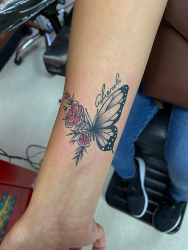 Explore pulp fiction tattoo ideas, creative tattoo ideas in San Diego, available at Wylde Sydes Tattoo & Body Piercing