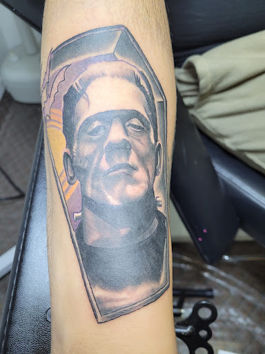 Explore sleeve tattoo idea, creative tattoo ideas in Angola, available at Hoodlum Ink