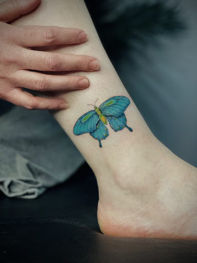 Explore female thigh tattoo ideas, creative tattoo ideas in Spearfish, available at Jordans Got A Gun