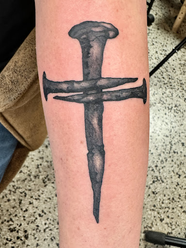 Explore ambigram tattoo ideas, creative tattoo ideas in Broxton, available at Seratonin Tattoo Parlor