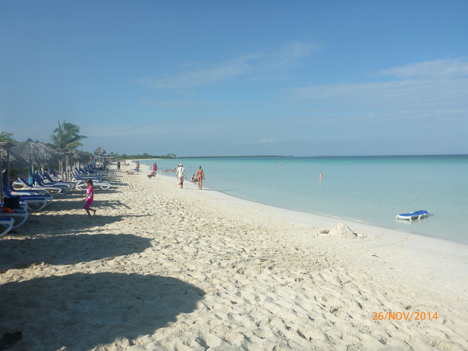 Foto av Playa Ensenachos med ljus fin sand yta