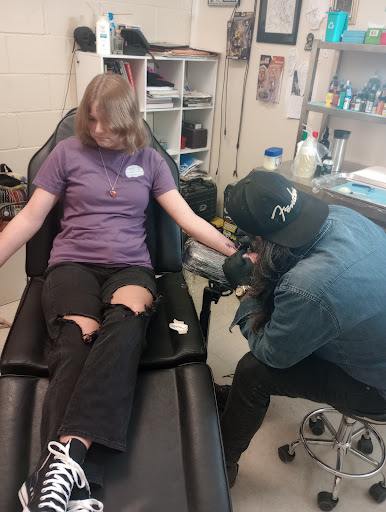 Explore male back tattoo ideas, creative tattoo ideas in Ozark, available at Tooth & Nail Tattoo & Piercing