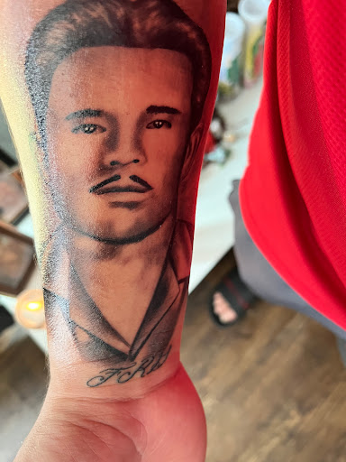 Explore cool neck tattoo ideas, creative tattoo ideas in Modesto, available at Ink Disciples Tattoo Parlor