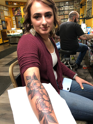 Explore love hate tattoo ideas, creative tattoo ideas in Duluth, available at Gitchee Gumee Tattoo