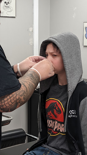 Find tattoo ideas for mom for your next unique tattoo in Kokomo at Pinpoint Piercing & Tattoo