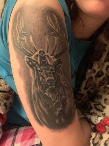 Explore predator tattoo ideas, creative tattoo ideas in Keene, available at Creative Ink Tattoo Studio