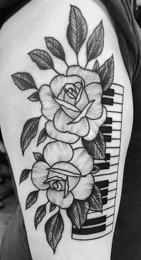 Explore traditional knee tattoo ideas, creative tattoo ideas in Modesto, available at Inkwell Tattoo