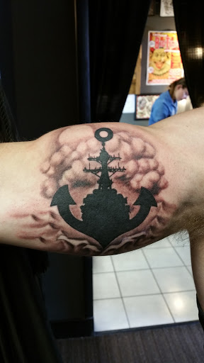 Explore melanie martinez tattoo ideas, creative tattoo ideas in Foley, available at Black Sheep Custom Tattoos and Piercings