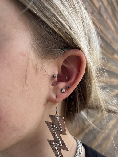 Explore nature sleeve tattoo ideas, creative tattoo ideas in Cody, available at Wyld Stone Piercings