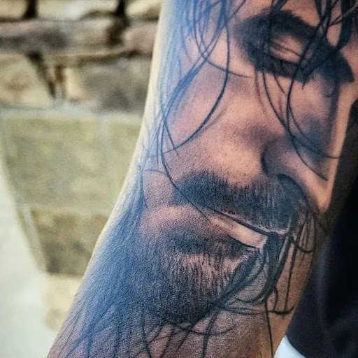 Explore cartoon tattoo ideas, creative tattoo ideas in Buford, available at Inked Arts Tattoo Studio