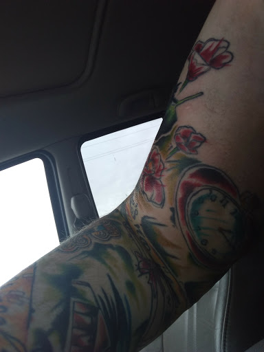 Explore rose and skull tattoo ideas, creative tattoo ideas in Hartselle, available at Art N Soul Tattoo