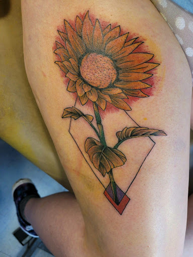 Explore feminine tattoo sleeve ideas, creative tattoo ideas in Hanceville, available at Wildman Tattoo and Body Piercing