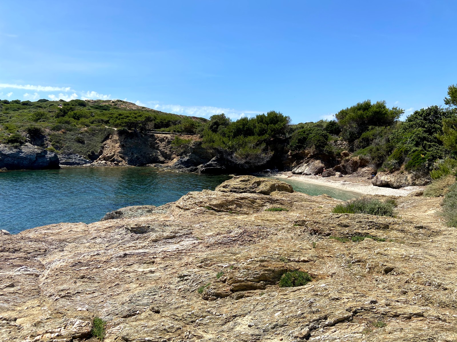 Foto di Plages Coucoussa con una superficie del acqua cristallina