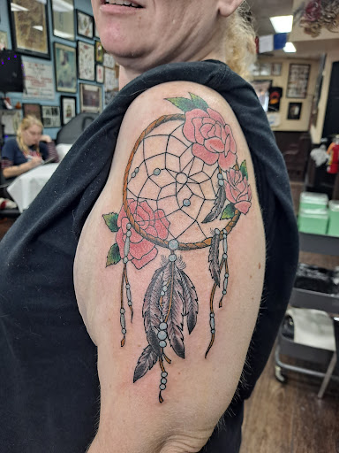 Explore women's lower back tattoo ideas, creative tattoo ideas in Philadelphia, available at Philadelphia Eddies Chinatown Tattoo